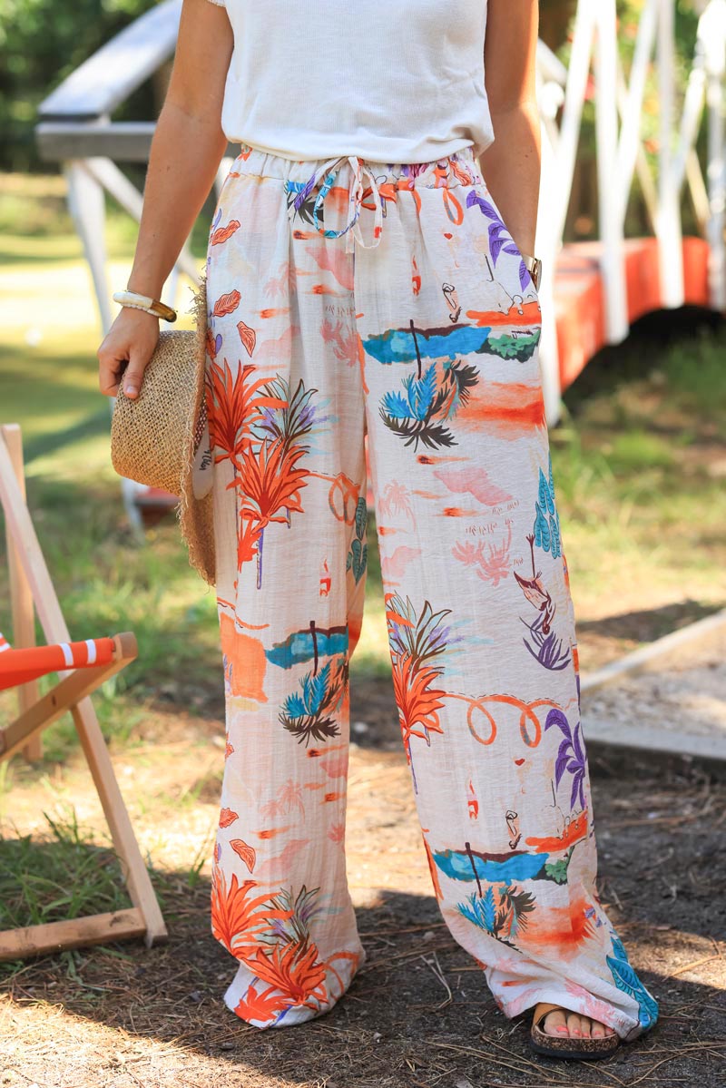 Ecru wide leg floaty pants with random colorful summer beach print