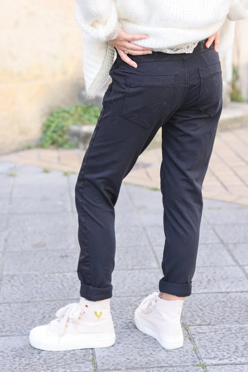 Pantalon noir bi matière toile et jersey stretch à boutons