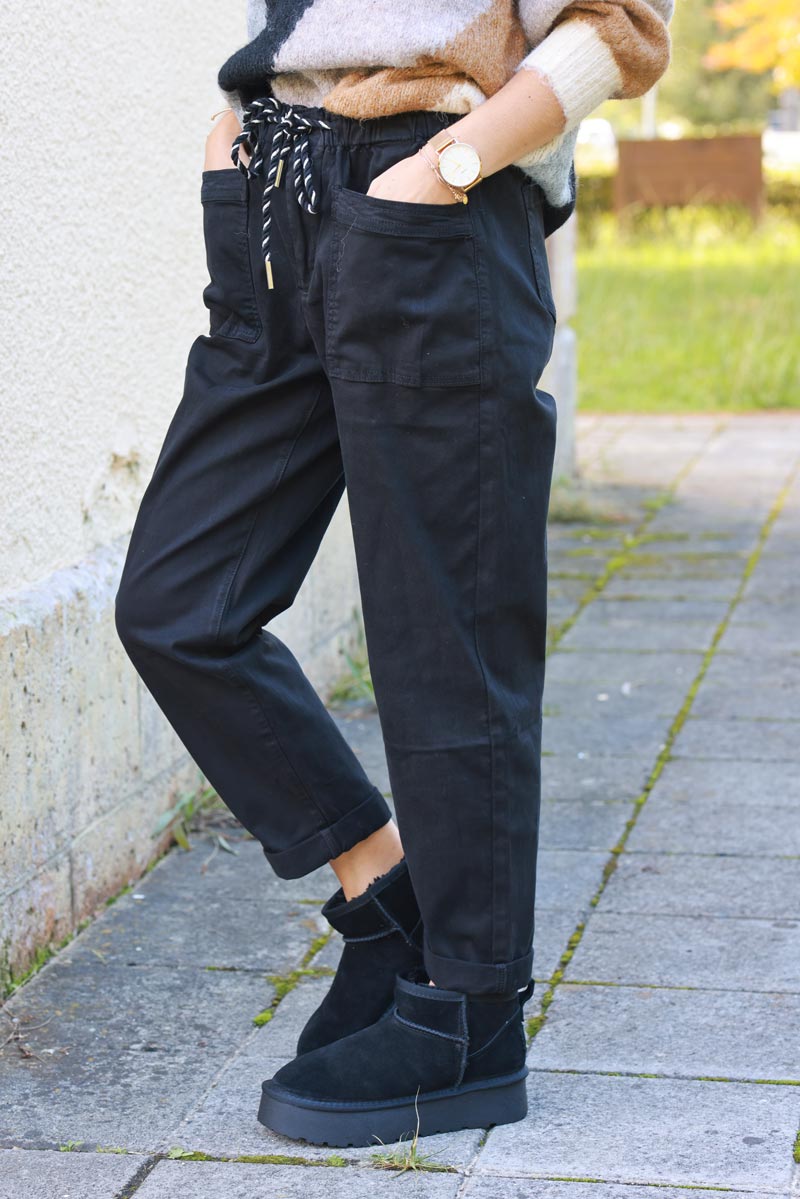 Pantalon noir coupe paper bag poches plaquées ceinture lien