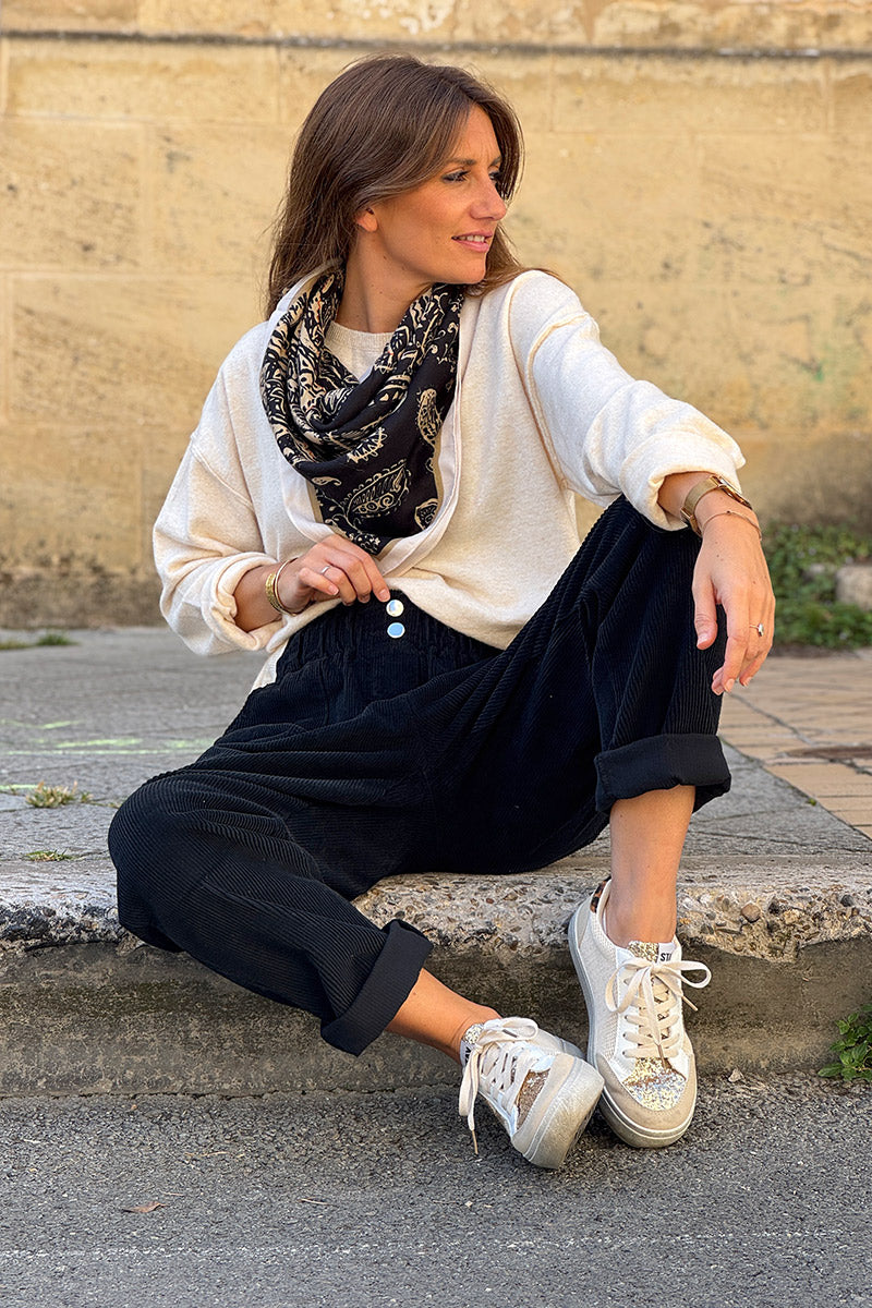Pantalon noir en velours côtelé coupe paperbag ceinture élastique