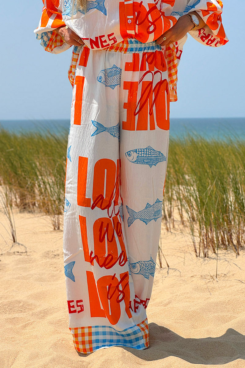 Orange “All We Need is Love” Pull-On Pants
