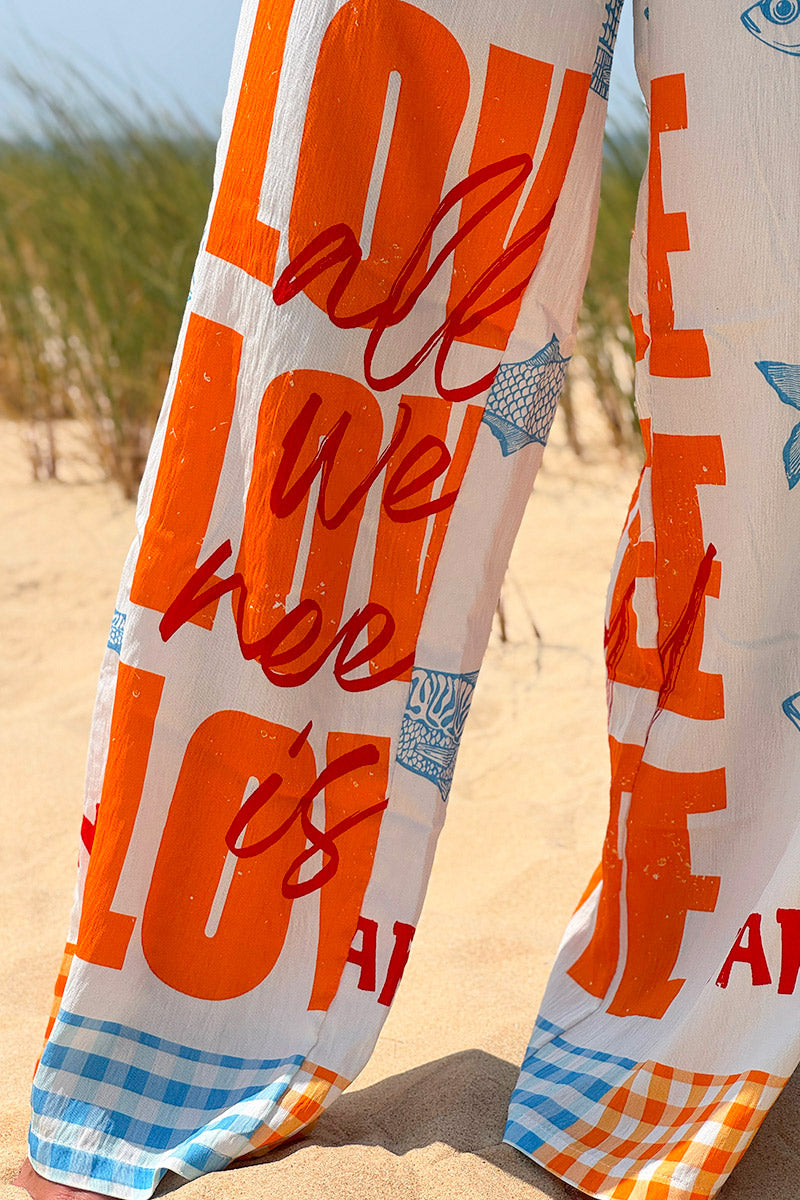 Orange “All We Need is Love” Pull-On Pants
