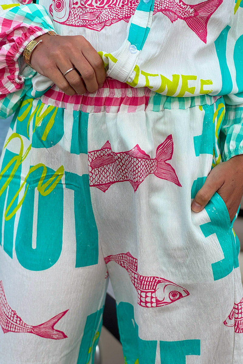 Turquoise “All We Need is Love” Pull-On Pants
