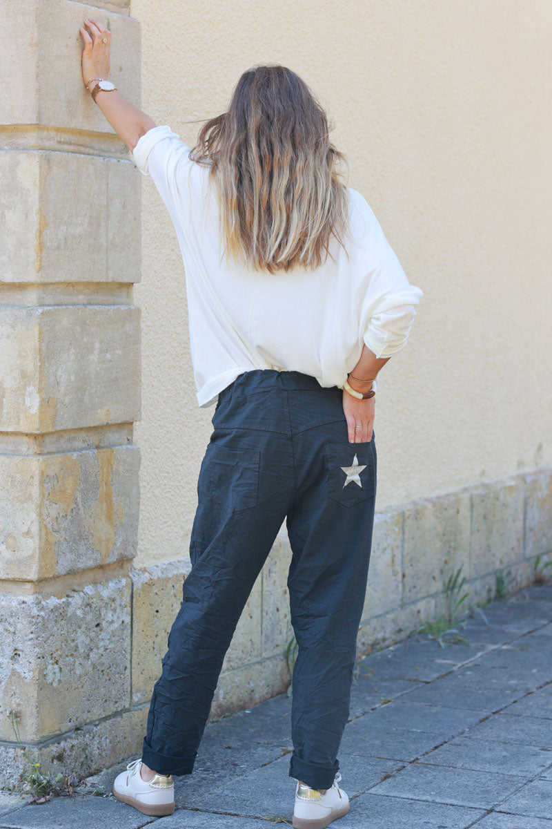 Pantalón confort gris antracita de lona elástica con estrellas brillantes y purpurina