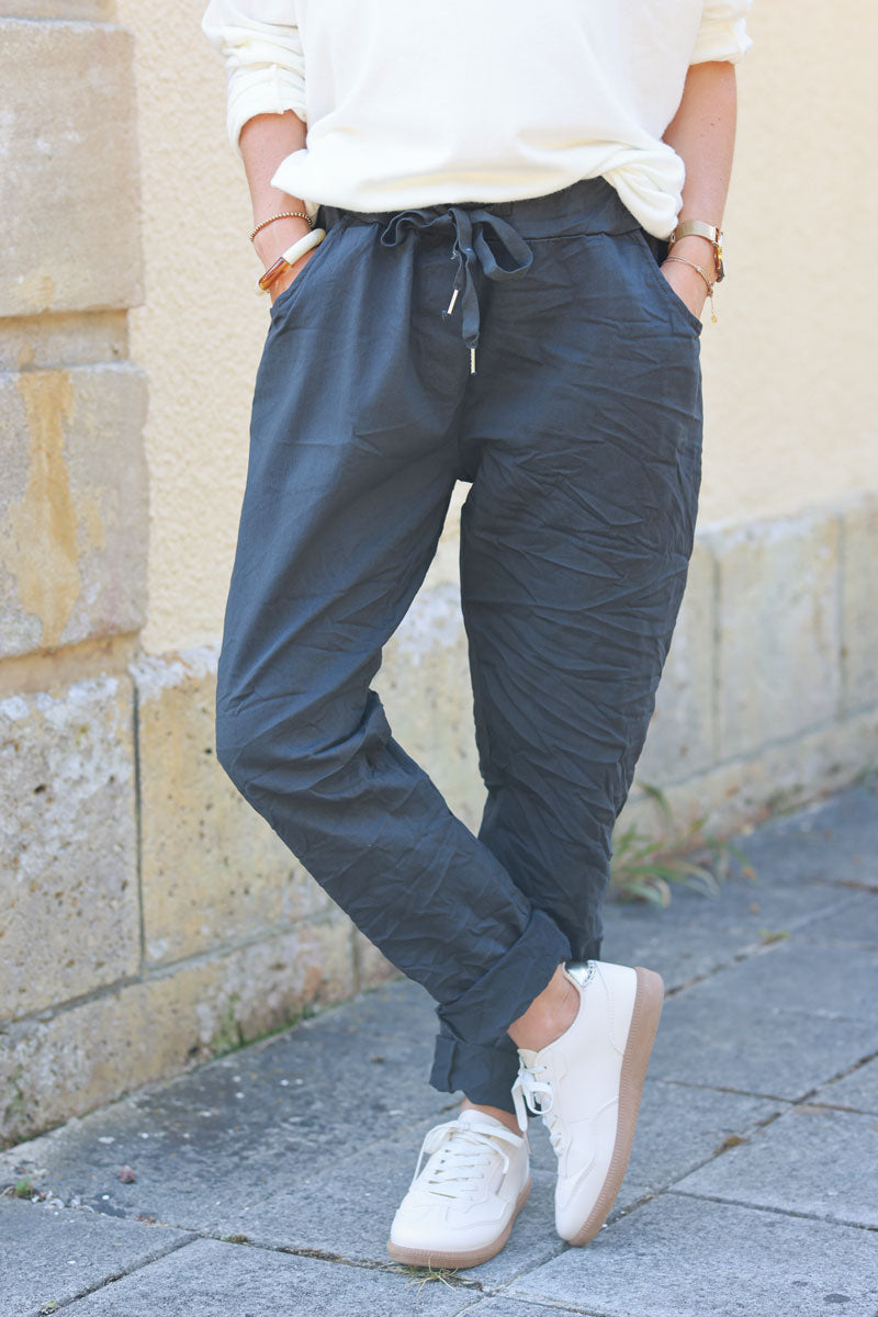 Gray comfort and stretch fabric pants with a glitter star