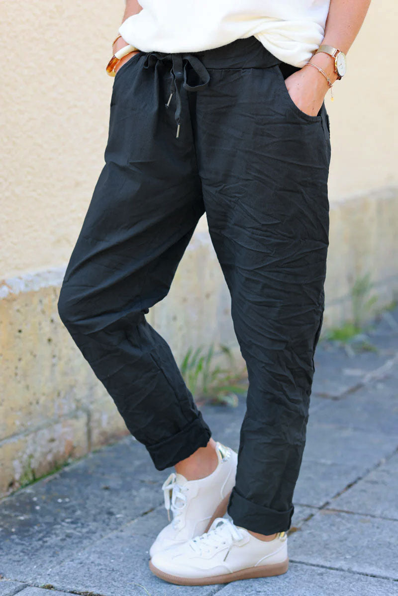 Gray comfort and stretch fabric pants with a glitter star