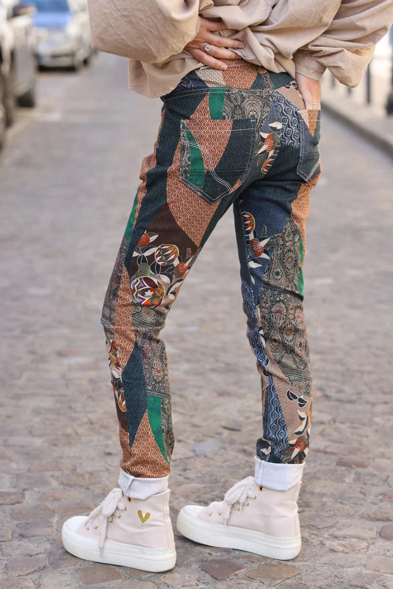 Soft touch jeans with patchwork print in camel, green and blue