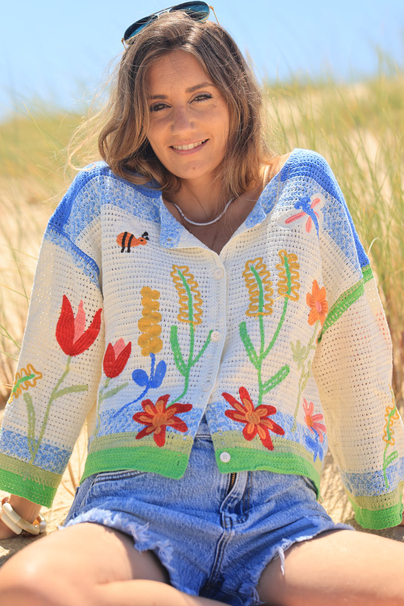 Colorful knitted cardigan with spring crochet pattern
