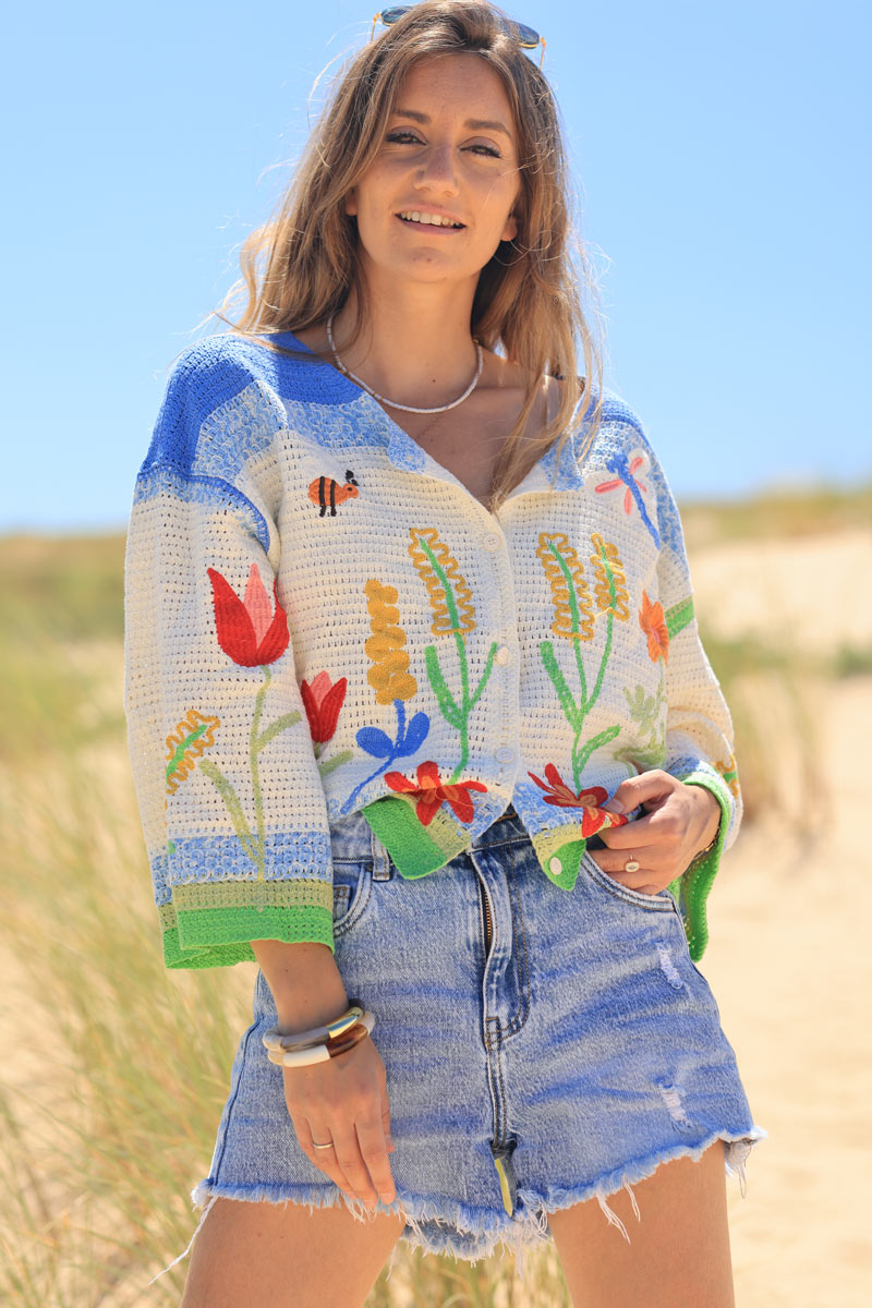 Colorful knitted cardigan with spring crochet pattern