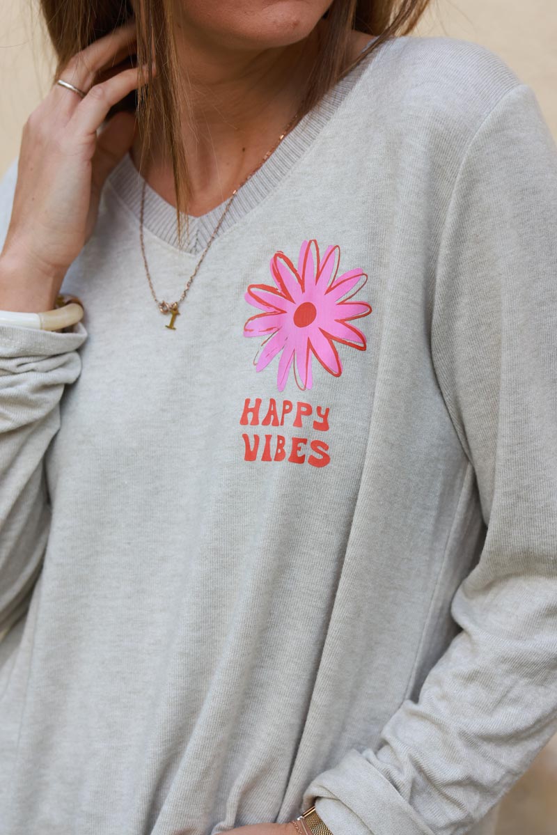 Petit pull beige en jersey col v côtelé Happy Vibes fleurs