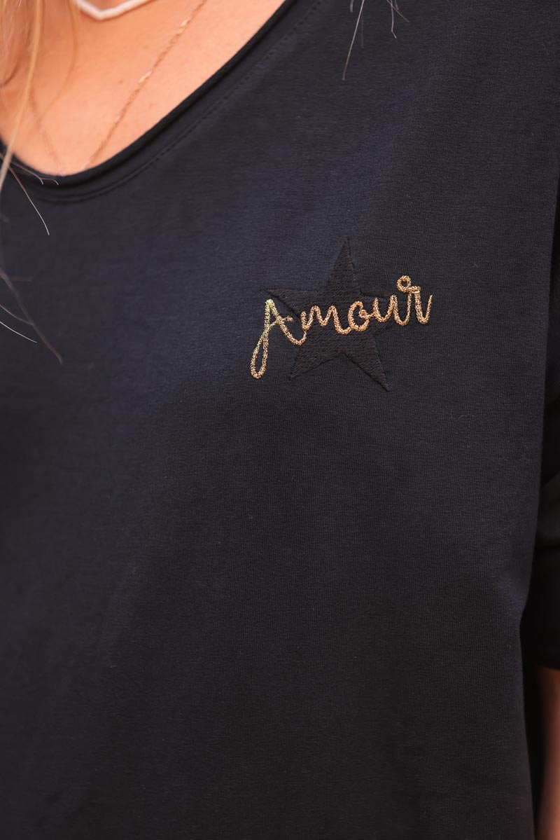 Black comfort sweater with gold star and 'amour' embroidery