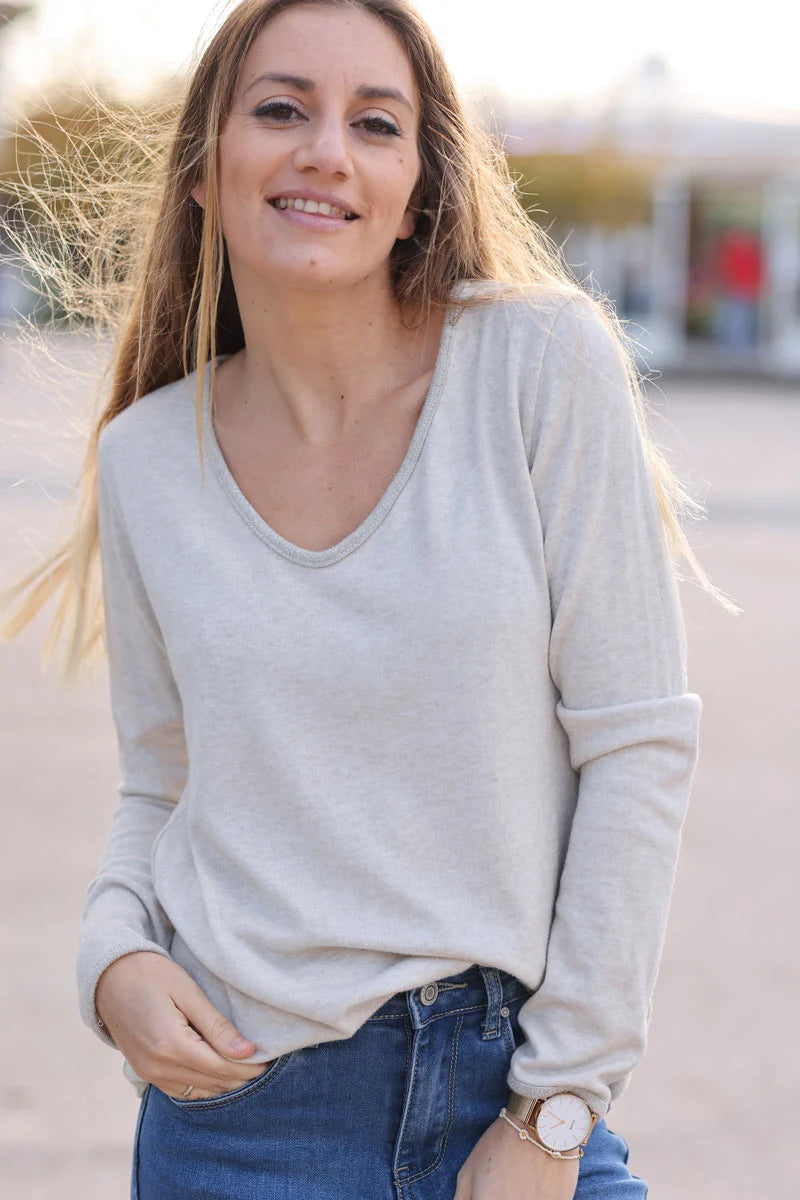 Beige lightweight sweater with silver glitter thread hems