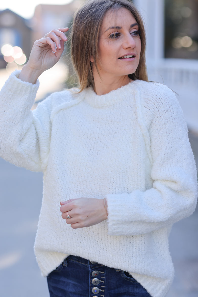 Off white bouclette knit sweater with inside out seams