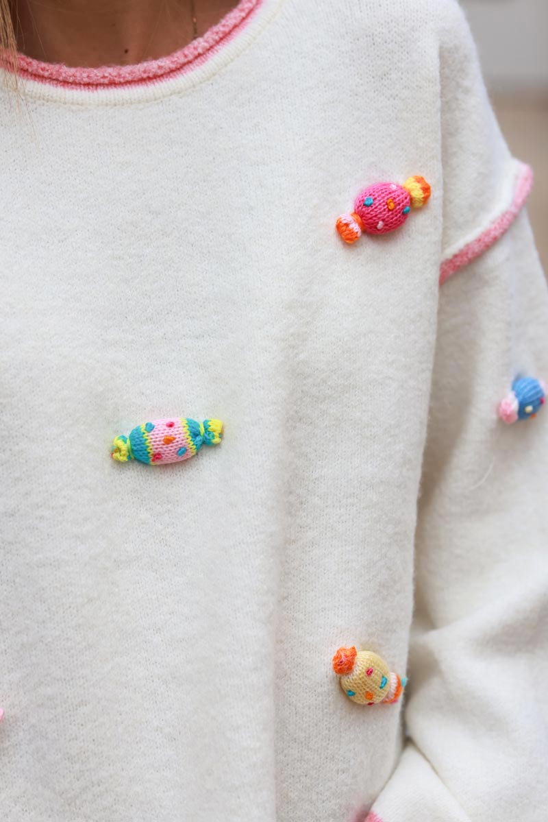 Off white sweater with small crochet candies in vibrant colors