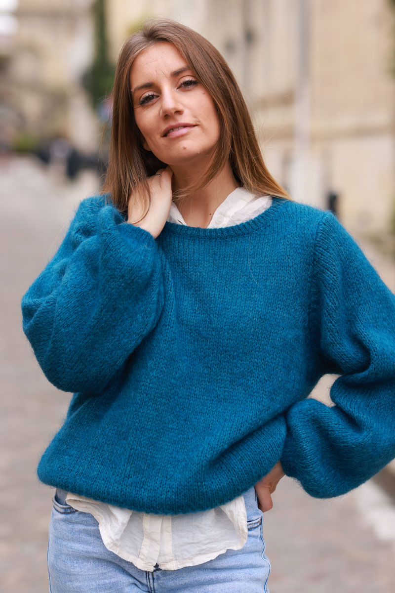 Jersey de punto azul pato con manga abullonada y cuello redondo