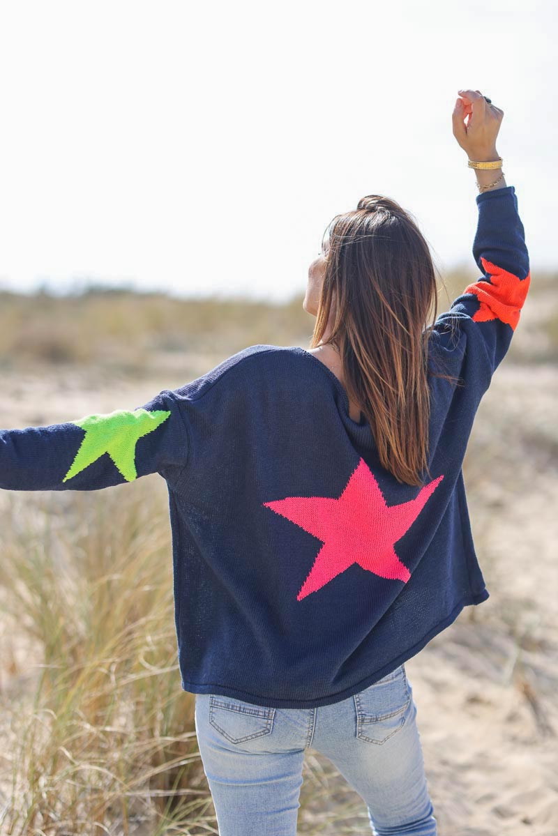 Navy blue knit sweater with colourful stars