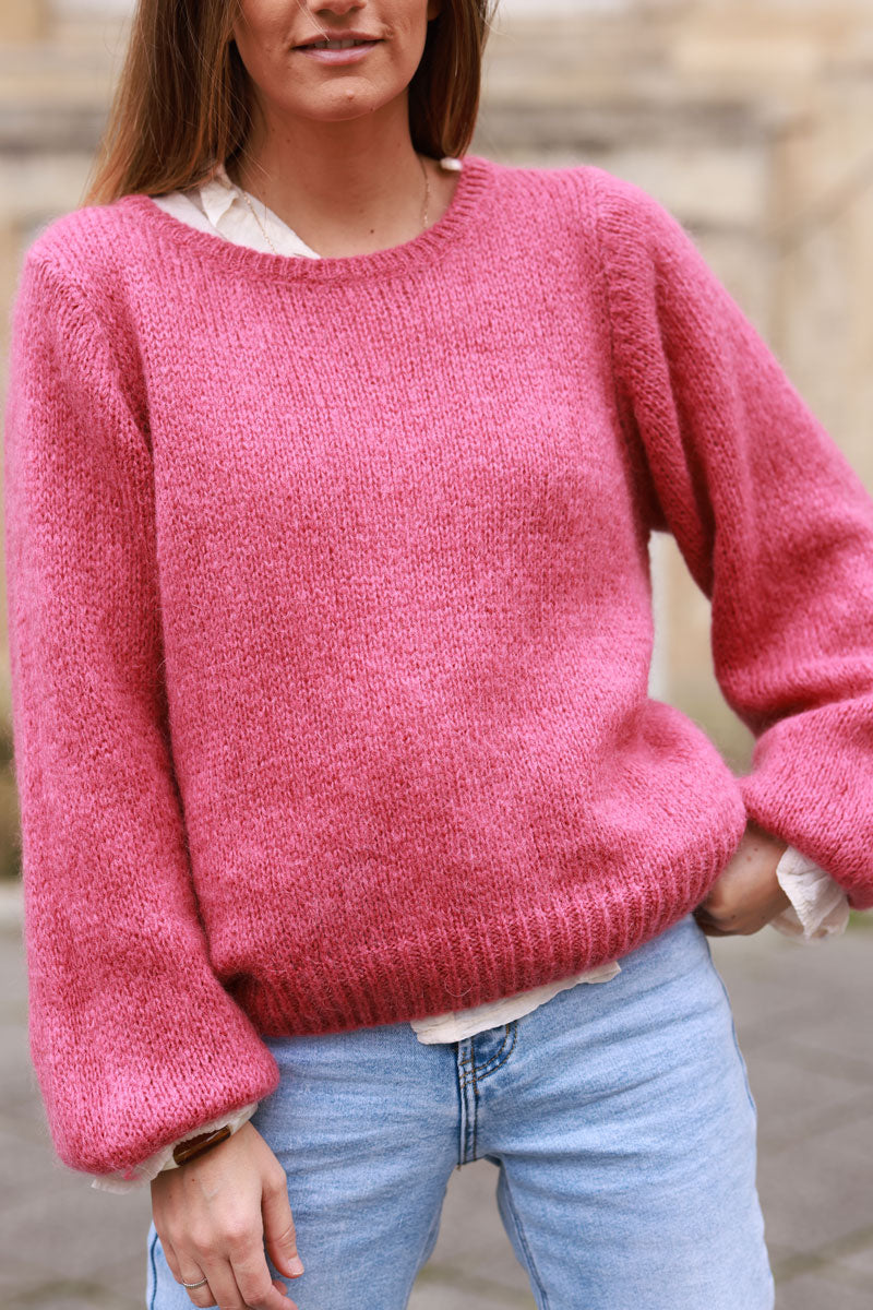 Jersey de punto palo rosa con manga abullonada y cuello redondo