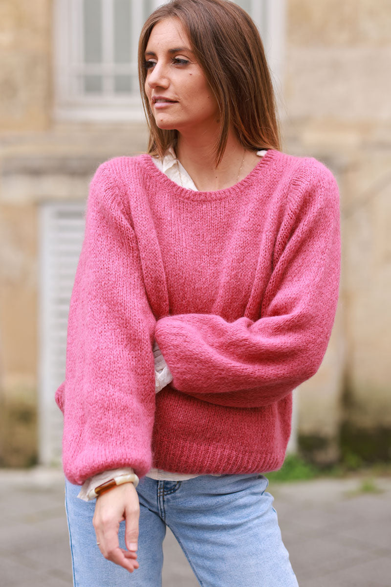 Jersey de punto palo rosa con manga abullonada y cuello redondo