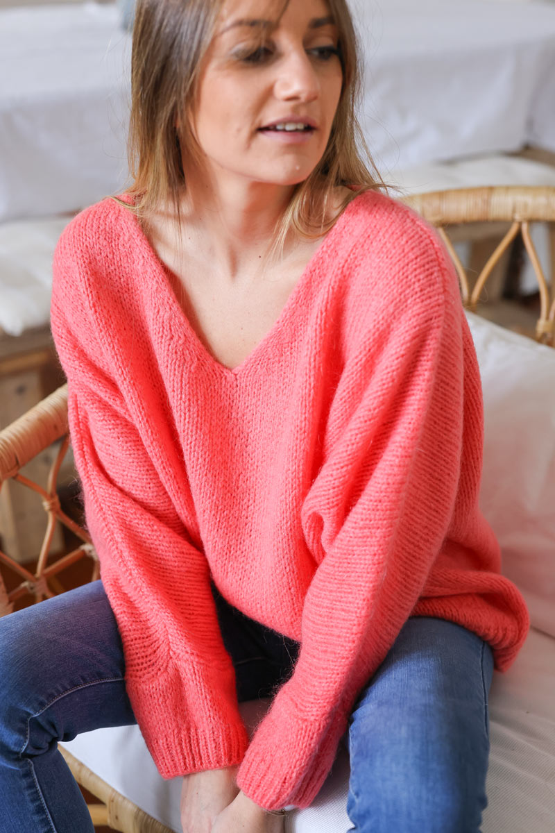 Coral woollen v-neck jumper with batwing sleeves