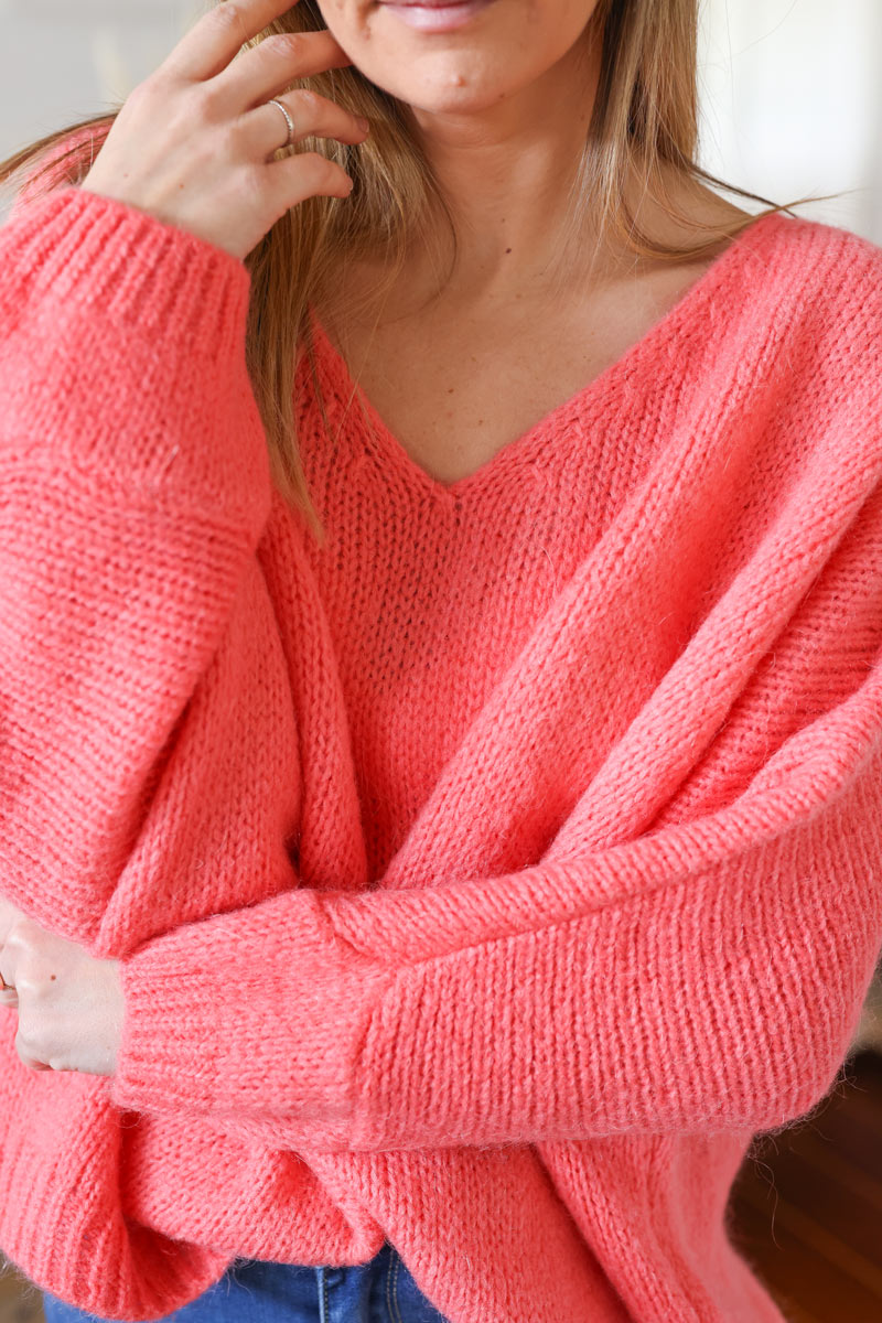 Coral woollen v-neck jumper with batwing sleeves