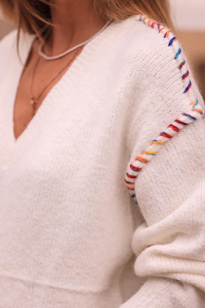 Off white chunky knit sweater with colorful stitch detail