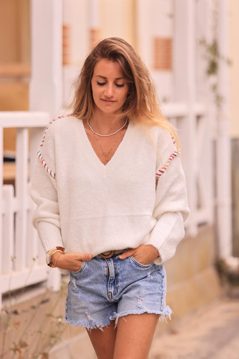 Off white chunky knit sweater with colorful stitch detail