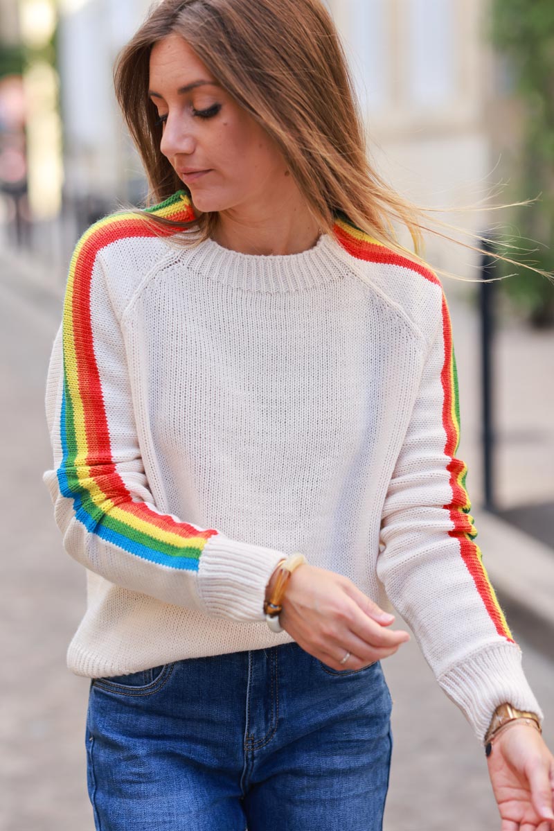 Ecru knit sweater with retro seventies vibe, rainbow sleeves and round ribbed neck