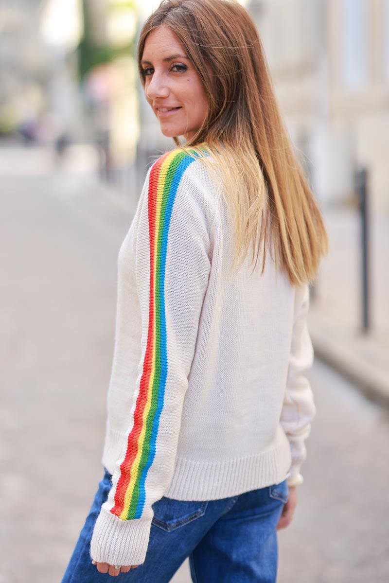 Ecru knit sweater with retro seventies vibe, rainbow sleeves and round ribbed neck