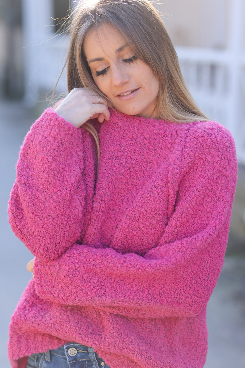 Fuchsia bouclette knit sweater with inside out seams