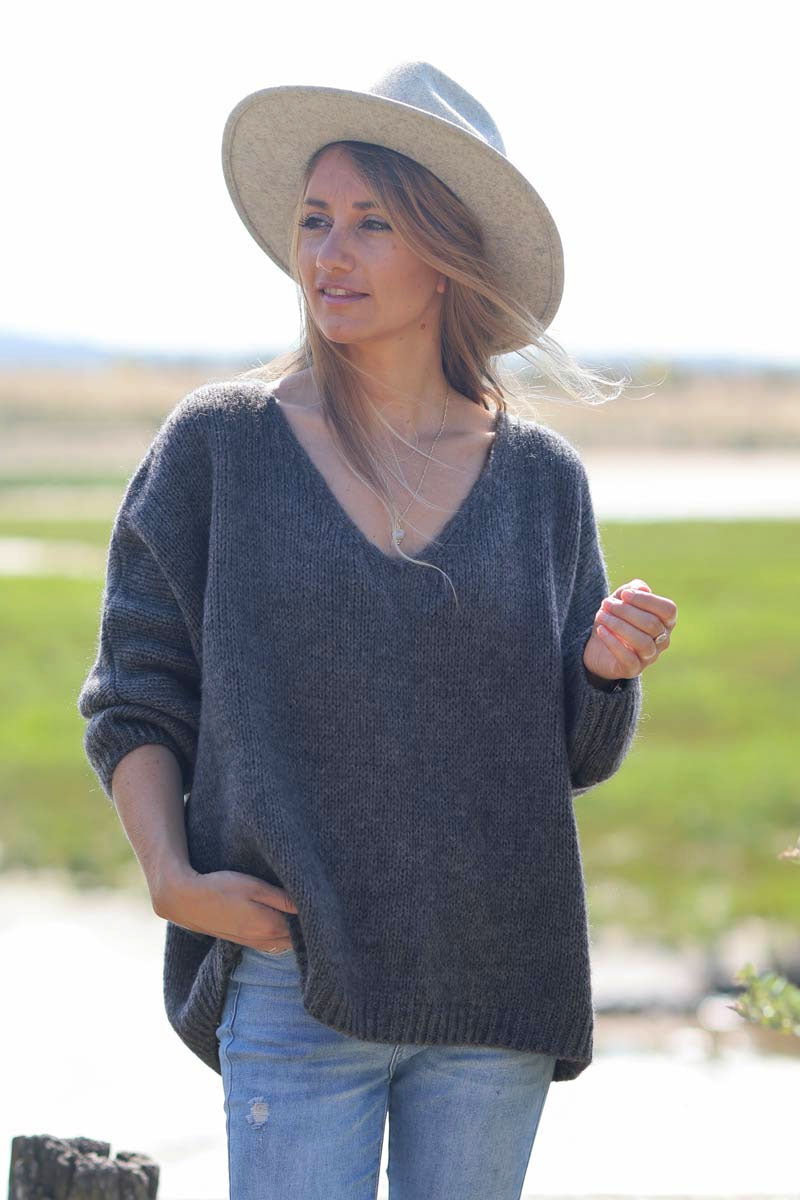 Dark gray mottled woollen v-neck jumper with batwing sleeves