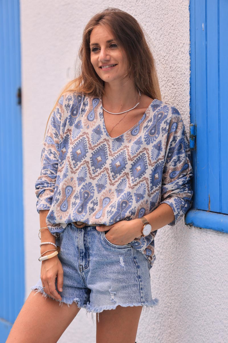 Blue fine knit jersey sweater with aztec print