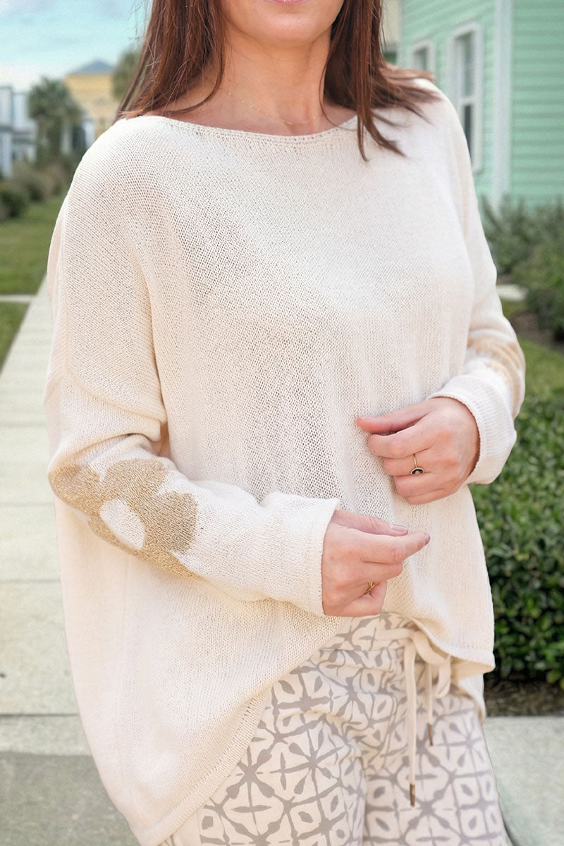 Beige cotton knit jumper with gold flowers on sleeves and back