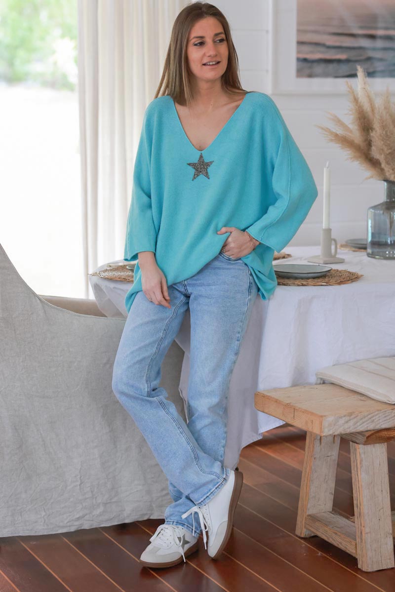 Pull large tout doux turquoise clair manches chauve-souris étoile strass