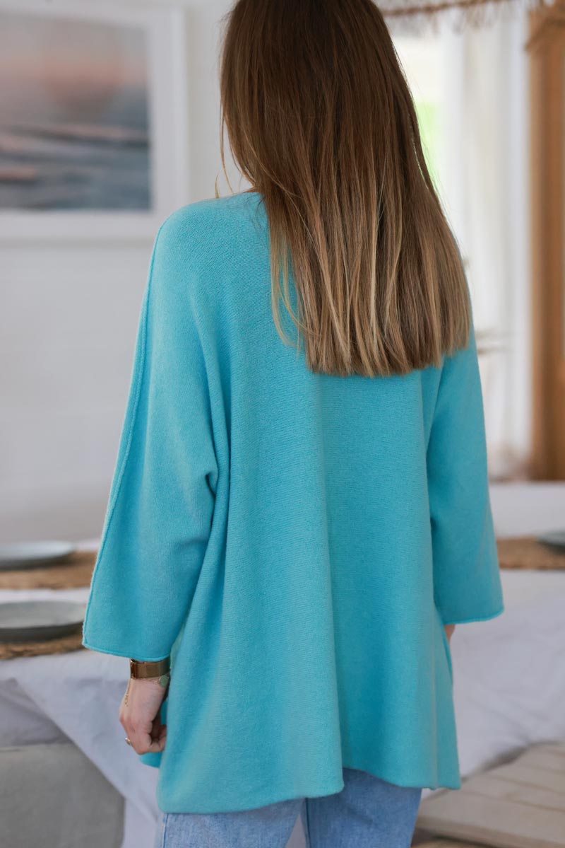 Pull large tout doux turquoise clair manches chauve-souris étoile strass