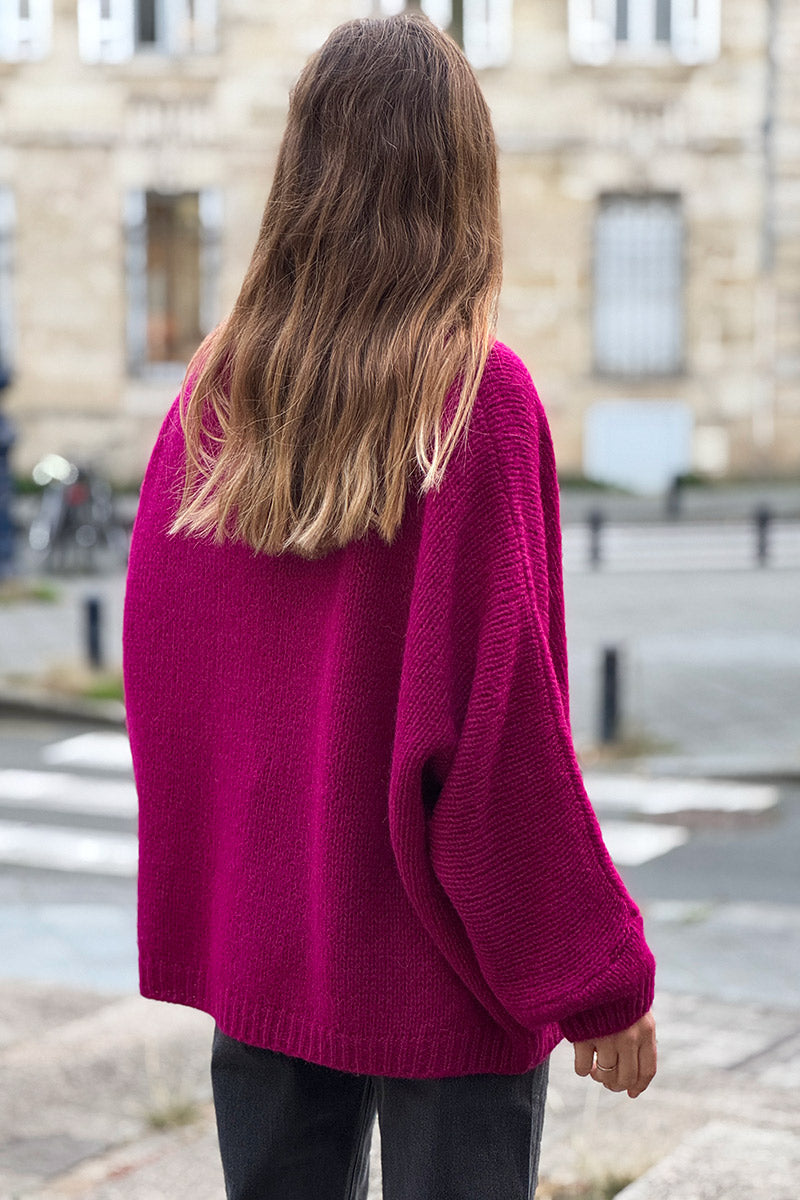 Pull lie de vin en maille col v manches chauve souris