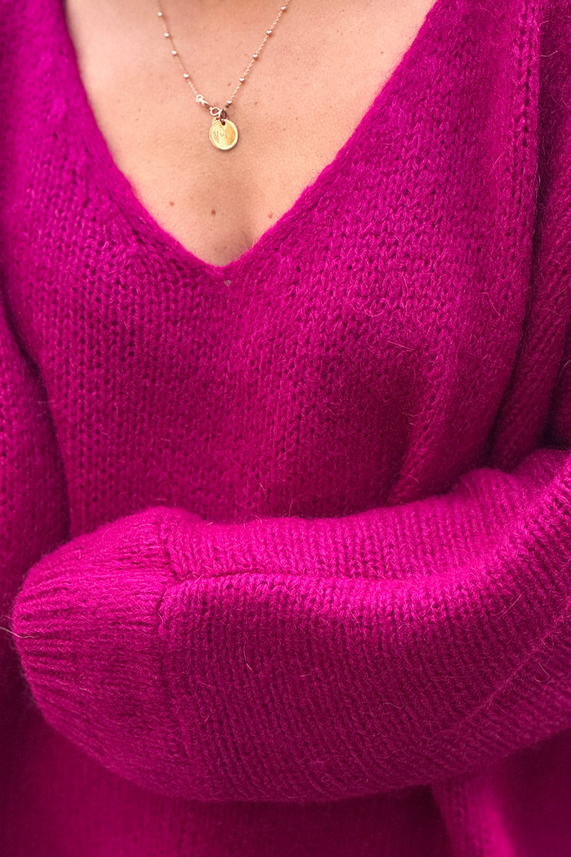 Pull lie de vin en maille col v manches chauve souris