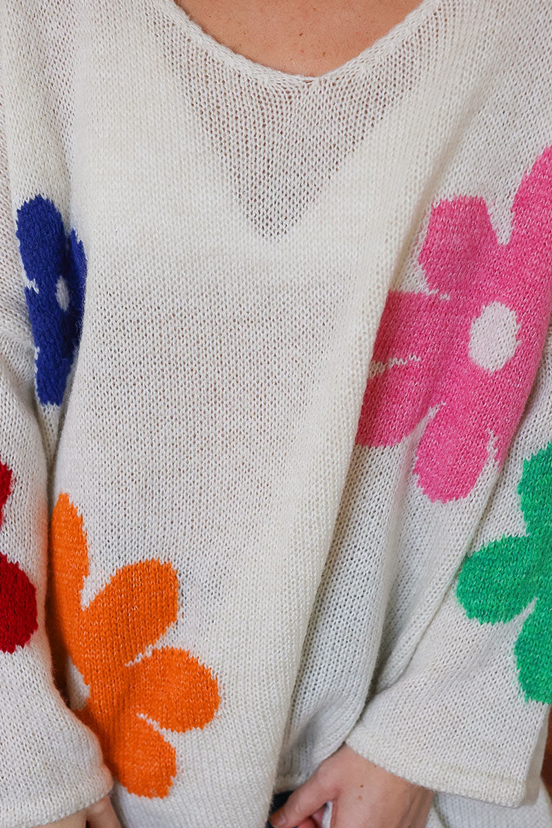 Oversized knit sweater in off white with colourful flower print