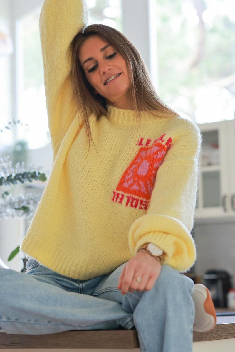 Pastel Yellow Chunky Knit Sweater with Vibrant Sun Embroidery