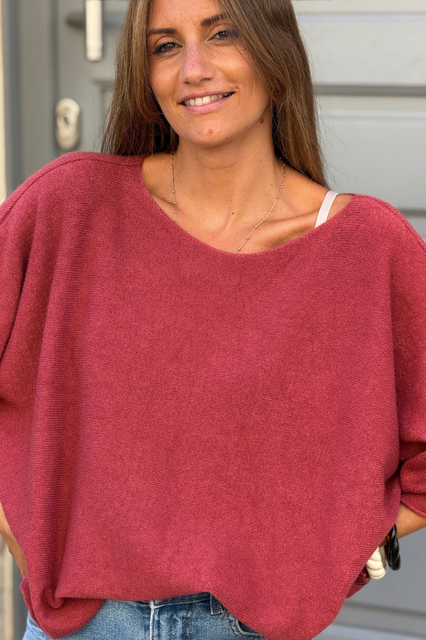 Pull moelleux et doux bois de rose à manches chauve-souris col rond