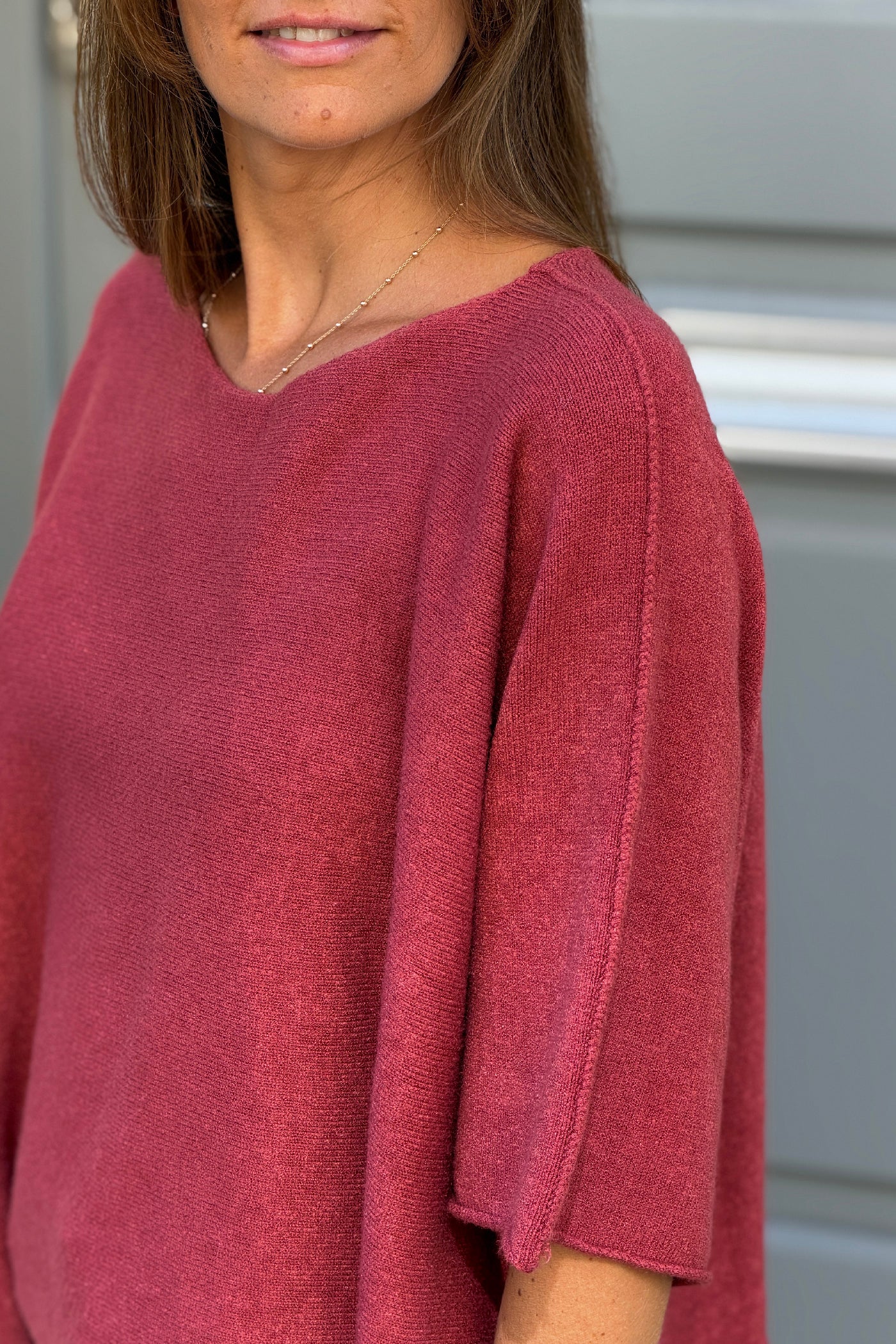 Pull moelleux et doux bois de rose à manches chauve-souris col rond