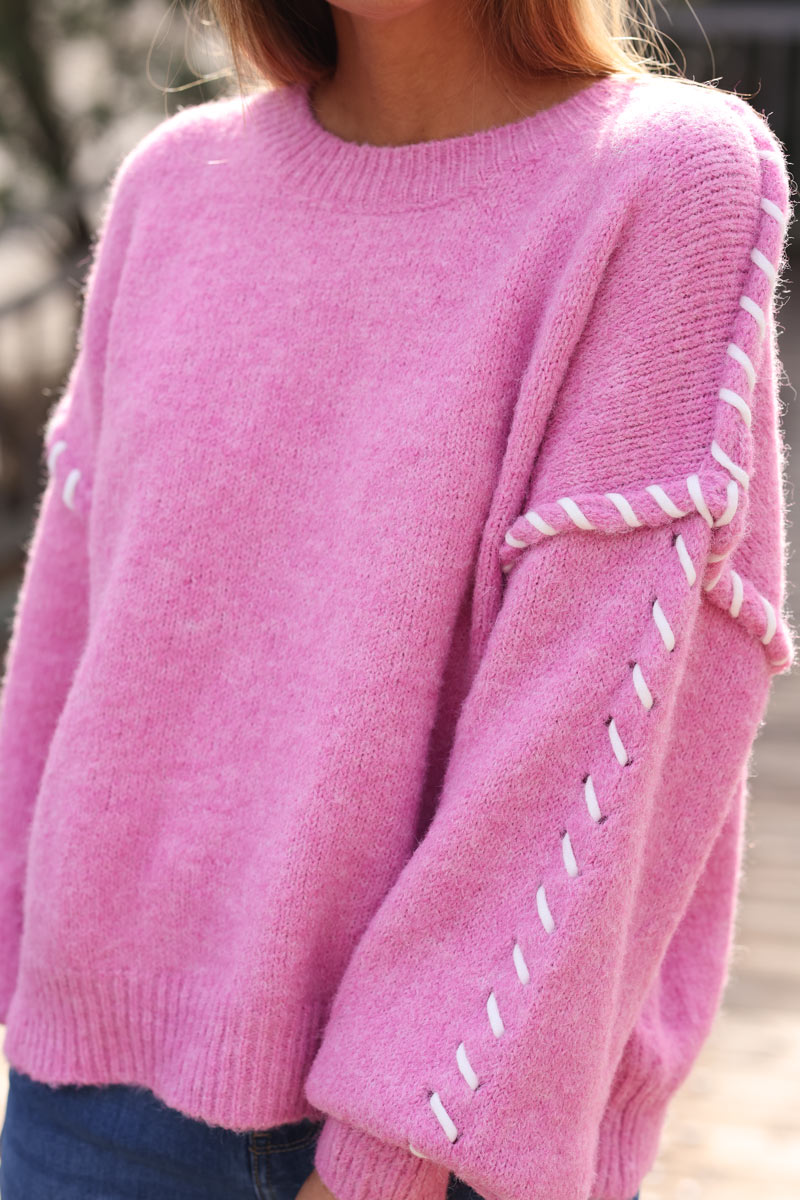 Chunky soft knit sweater in heather pink with inside out stitch detail