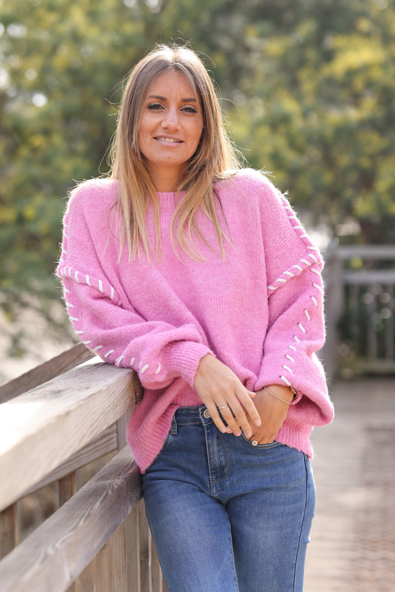 Chunky soft knit sweater in heather pink with inside out stitch detail