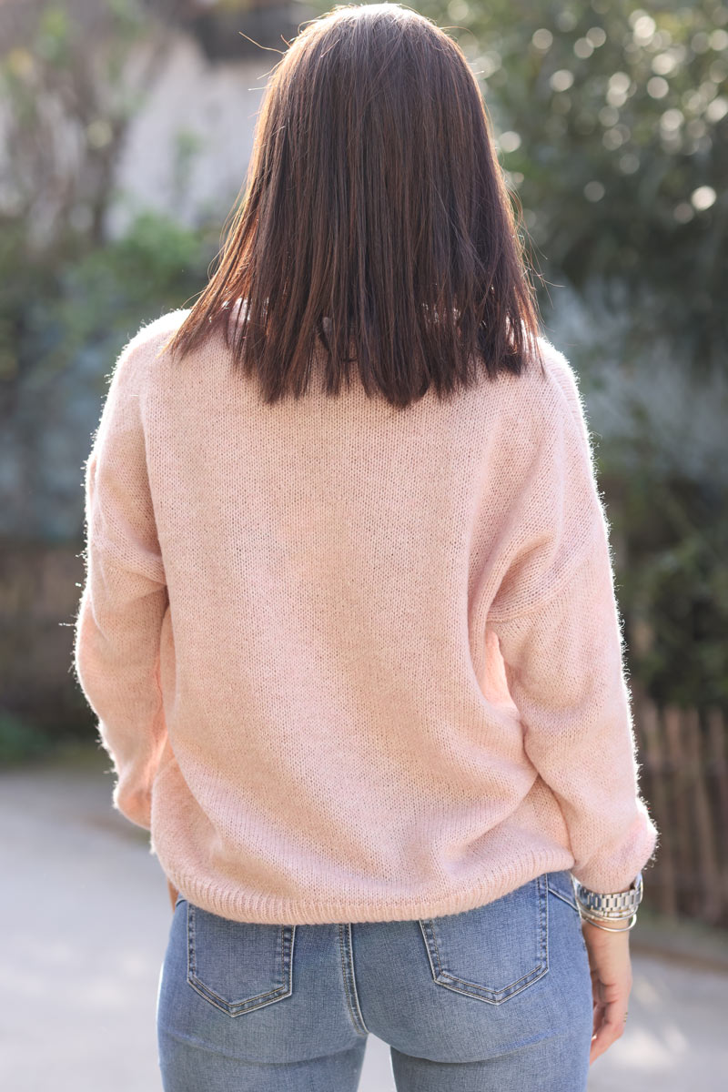 Jersey de punto rosa empolvado con cuello de pico y encaje