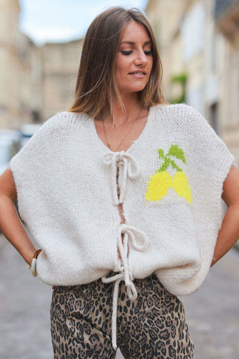 Pull sans manches beige grosse maille avec nœuds motif citrons