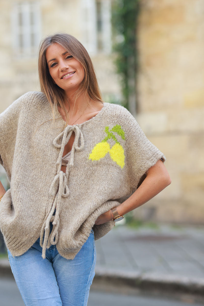 Taupe sleeveless chunky knit tie front sweater with lemon pattern