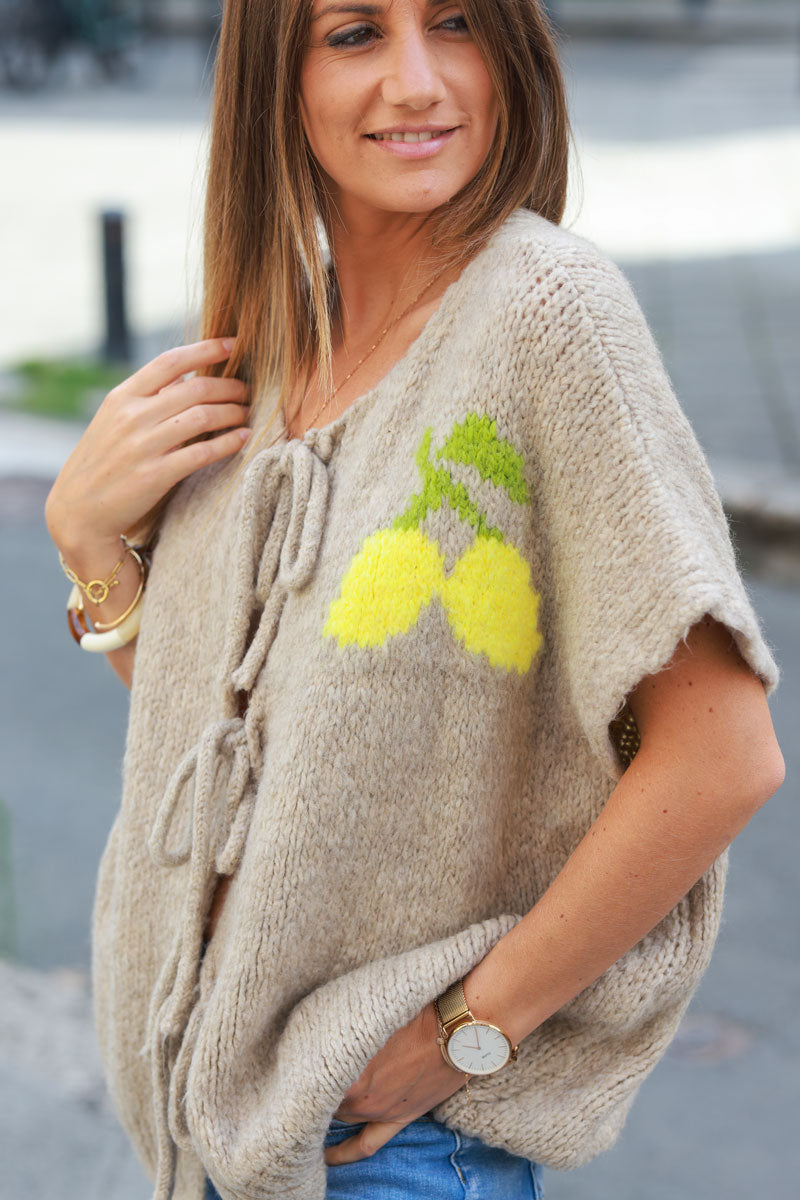 Taupe sleeveless chunky knit tie front jumper with lemon pattern