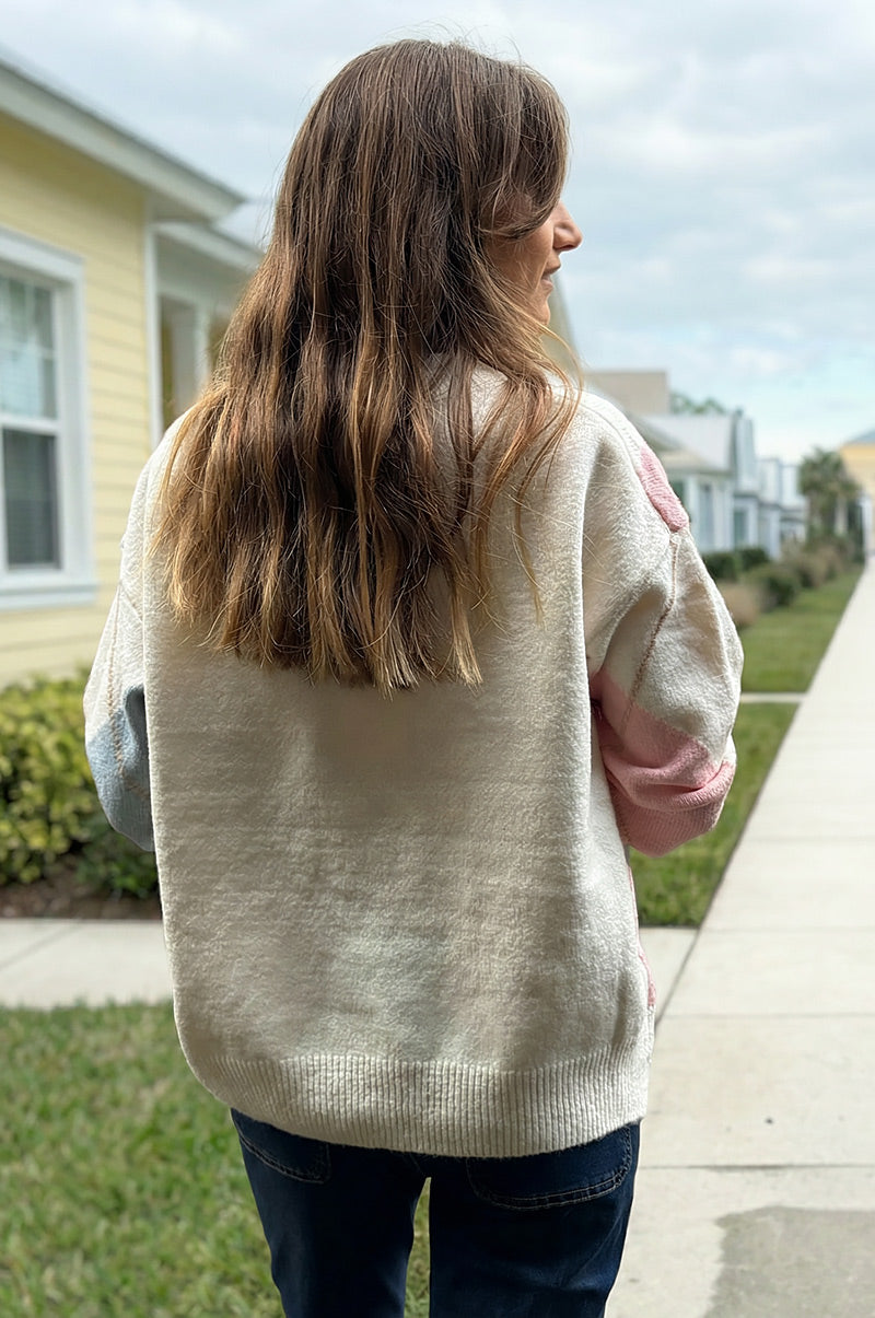 Pull tout doux et moelleux écru motif losanges jacquard tons pastels rose et bleu
