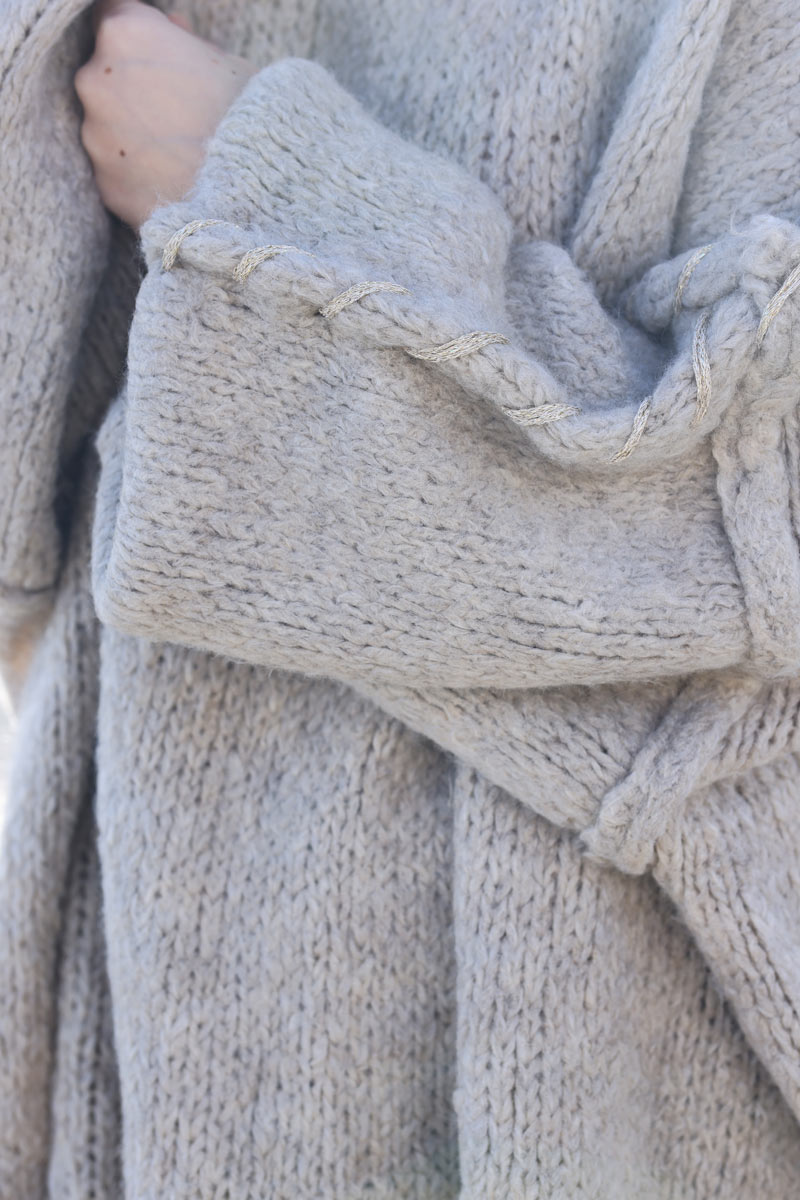 Oversized chunky knit sweater in beige with gold seam stitching detail