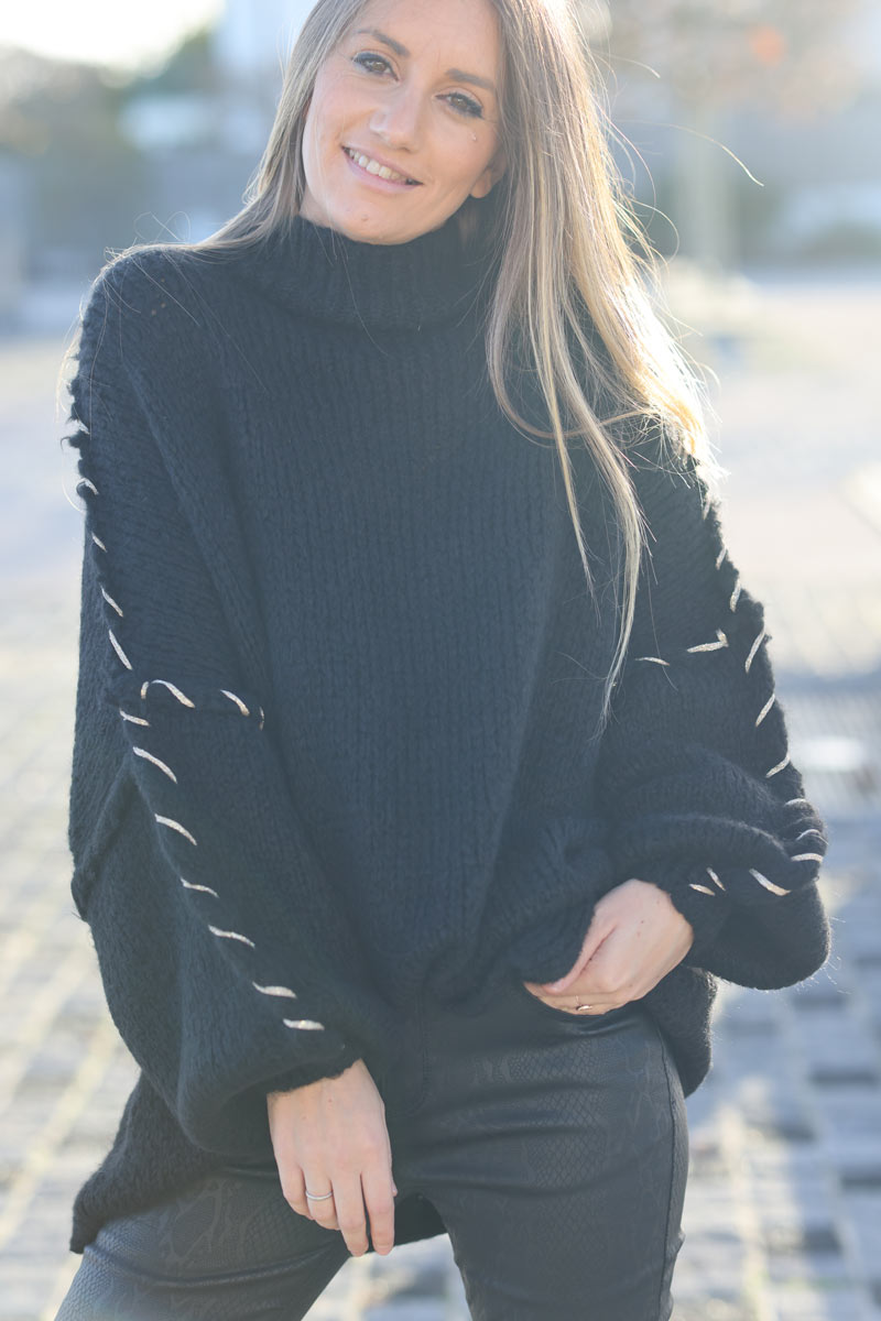 Oversized chunky knit sweater in black with gold seam stitching detail