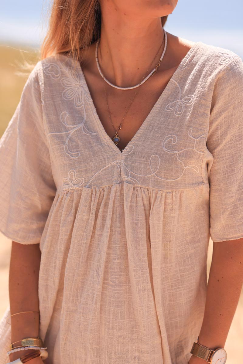 Beige woven cotton dress with fine embroidery on collar